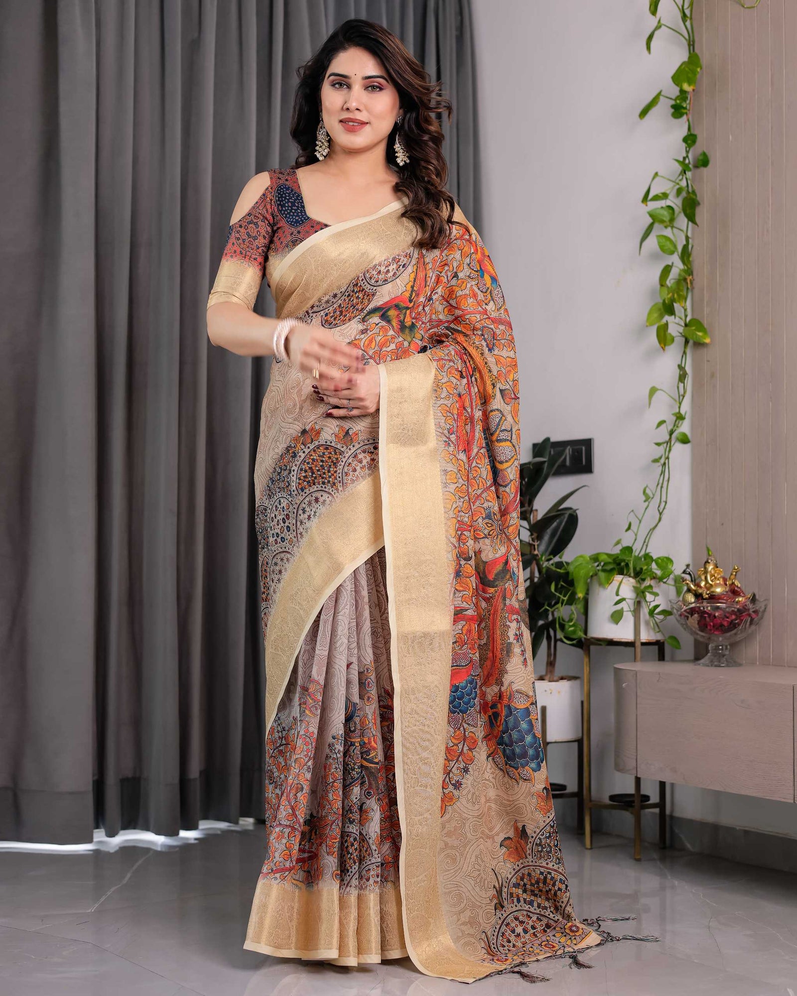 Cream Printed Saree with Elegant Golden Border & Artistic Peacock Pallu
