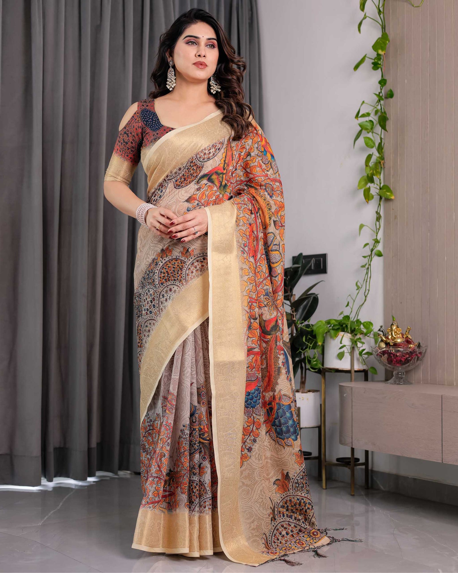 Cream Printed Saree with Elegant Golden Border & Artistic Peacock Pallu
