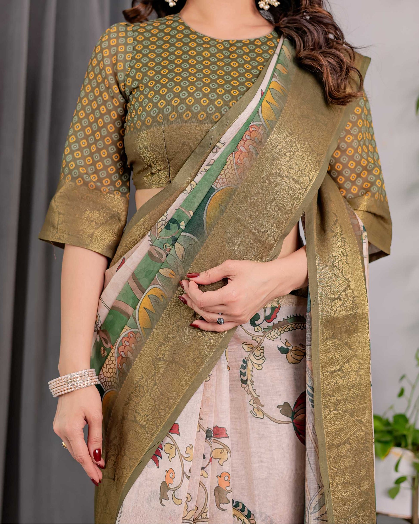 Olive Green Printed Saree with Rich Golden Border